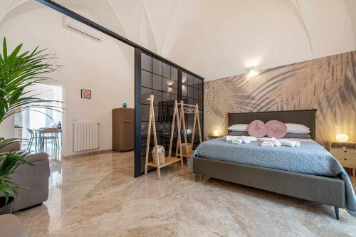 Postel nebo postele na pokoji v ubytování Zephir Apartments