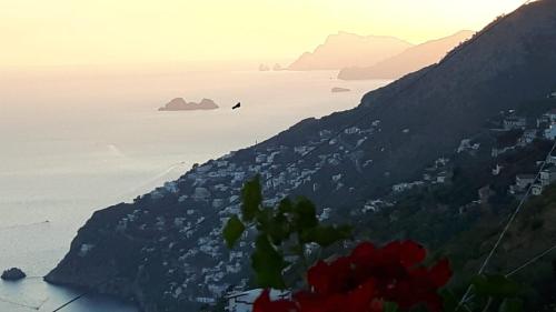 a view of the amalfi coast at sunset at Casa Barbara in Amalfi