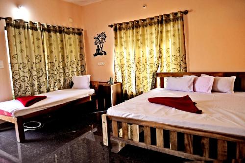 a bedroom with two twin beds and curtains at Sirimane Homestay - Swimming Pool, Food, Near to Falls & Trek in Sakleshpur