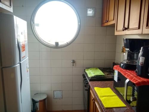 Η κουζίνα ή μικρή κουζίνα στο Departamento 100% equipado y excelente ubicación