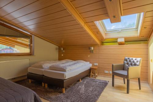 Säng eller sängar i ett rum på Haus Almkreek