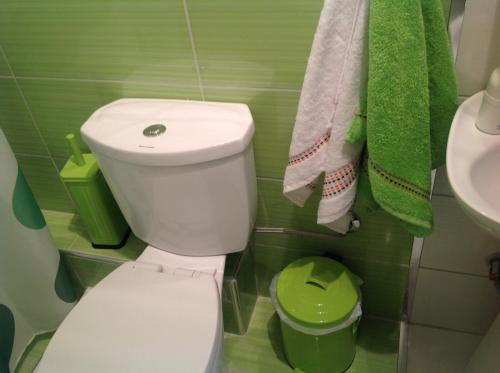 a bathroom with a white toilet and a sink at MyParalia apartament ***** in Paralia Katerinis
