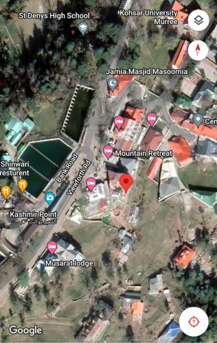 a map of a school with pointers to different places at Cozy Cottage at Afgan Lodge in Murree