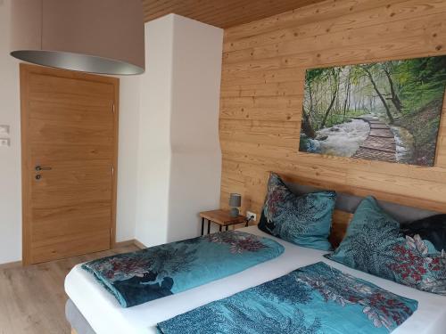 Кровать или кровати в номере Ferienwohnung Fabiella mit Balkon Döbriach