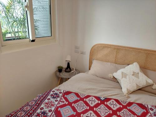 Cama o camas de una habitación en Xinhouse Homestay