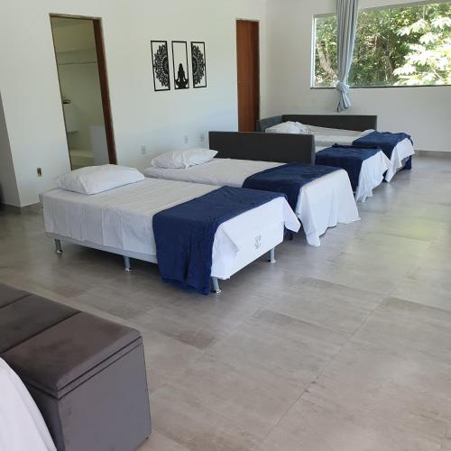 Кровать или кровати в номере Recantoarraialdajuda