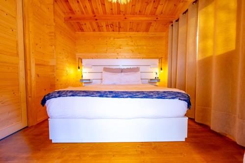 Ένα ή περισσότερα κρεβάτια σε δωμάτιο στο Quinta do Quinto