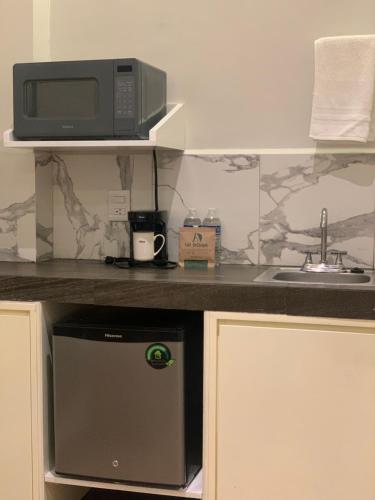 Kuchyň nebo kuchyňský kout v ubytování BERTHEL SUITES