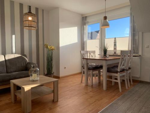 Et opholdsområde på Kleine Brise Apartment 7