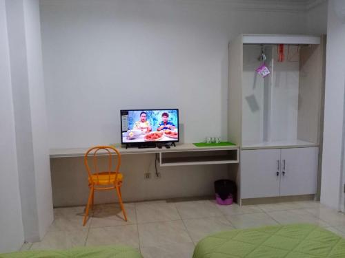 TV a/nebo společenská místnost v ubytování DACOSTEL Syariah