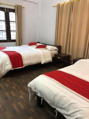 Postel nebo postele na pokoji v ubytování Hotel Bhagya