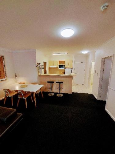 A seating area at Superb 2 BR East Perth Riverside Apartment Location Comfort and Space 45