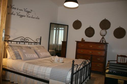 Posteľ alebo postele v izbe v ubytovaní Casa Loconte