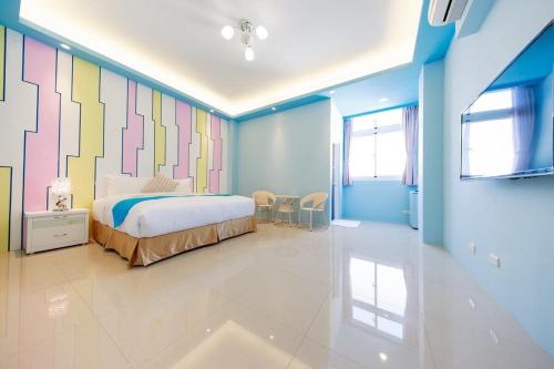 Postel nebo postele na pokoji v ubytování Mu Yu B&B