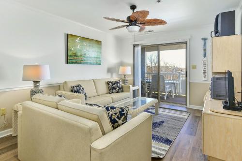 a living room with two couches and a ceiling fan at Harbour Club 12G in Ocean City
