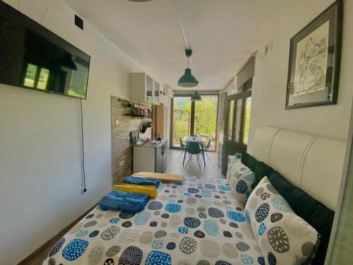 a bedroom with a bed with pillows on it at Apartman Verona Buzet in Buzet