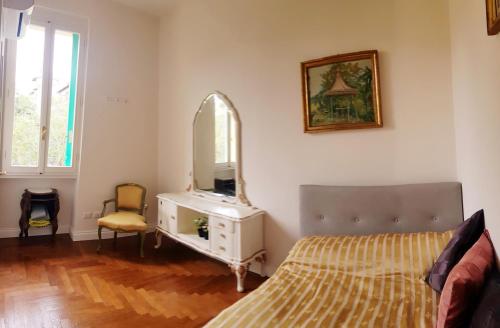 Ένα ή περισσότερα κρεβάτια σε δωμάτιο στο Residenza I Marchesi