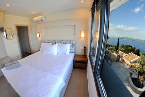Postelja oz. postelje v sobi nastanitve Ionian Stone Luxury Villa