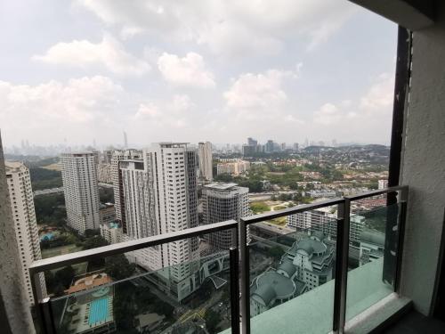 a view from a balcony of a city at The Ooak Suites and Residence@ Kiara 163 in Kuala Lumpur