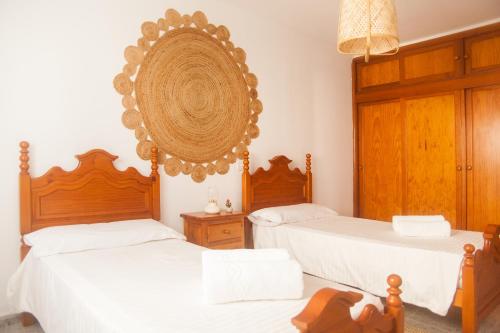 Postel nebo postele na pokoji v ubytování Apartamentos Thaisay MALIBU