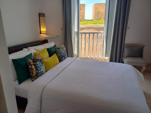 Ένα ή περισσότερα κρεβάτια σε δωμάτιο στο Jack's Apartments & Suites