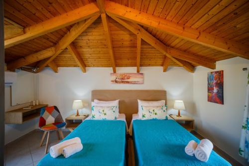 Postel nebo postele na pokoji v ubytování Porto Gerakas Villas