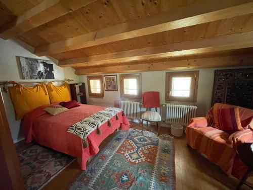 A bed or beds in a room at La Casa del Glicine