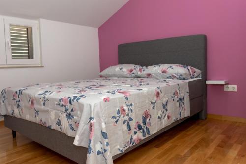 Giường trong phòng chung tại Apartment Plazonić