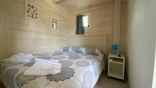 Кровать или кровати в номере Cottage Mare e Stelle