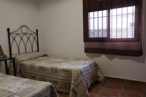 Postel nebo postele na pokoji v ubytování Chalet Ventura Conil