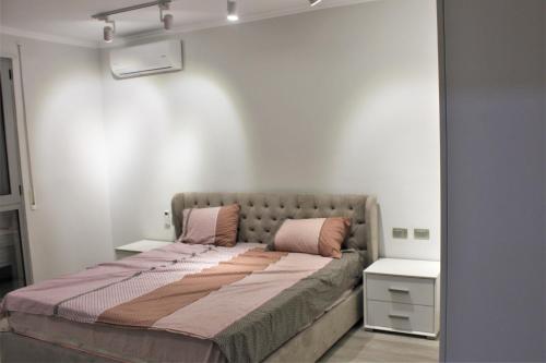 En eller flere senger på et rom på Adriatic Getaway