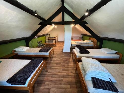 Tempat tidur dalam kamar di Le Gite De Malchamps