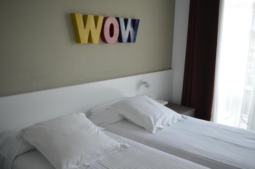 Postel nebo postele na pokoji v ubytování Hotel Nou Estrelles