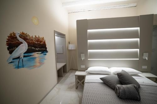 Ένα ή περισσότερα κρεβάτια σε δωμάτιο στο That's Amore Accommodation Tropea