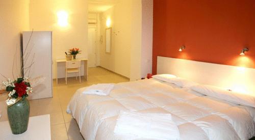 Katil atau katil-katil dalam bilik di Hotel La Punta
