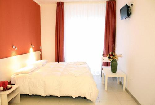 Katil atau katil-katil dalam bilik di Hotel La Punta