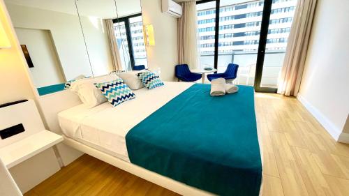 Кровать или кровати в номере Apartments Black Sea Resort Luxe