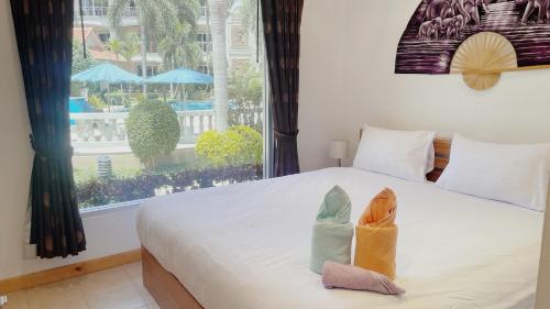 Легло или легла в стая в 3 Bedroom Villa Praitumnak soi 4 by Zoom Pattaya