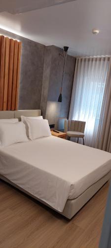 Ένα ή περισσότερα κρεβάτια σε δωμάτιο στο Hotel Amadora Palace