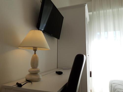 TV a/nebo společenská místnost v ubytování Hotel Danubio