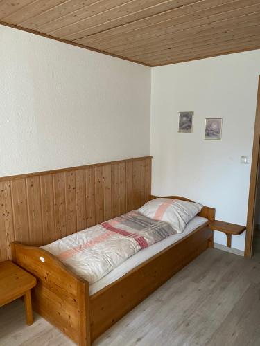 Postel nebo postele na pokoji v ubytování Pension am Eichenhain