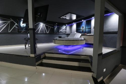 Кровать или кровати в номере Exótico Prime Motel