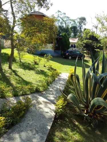 Taman di luar CHALES Canto dos Pássaros