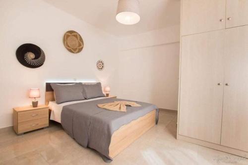Postel nebo postele na pokoji v ubytování Soleil Apt 1