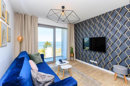 TV a/nebo společenská místnost v ubytování Balticus Apartamenty Promenada Gwiazd 14