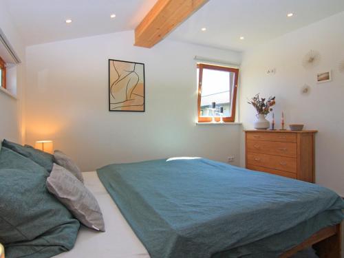Postel nebo postele na pokoji v ubytování Blockhaus in Damp