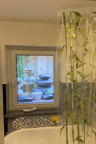 TV a/nebo společenská místnost v ubytování Ferienhaus am Bergl