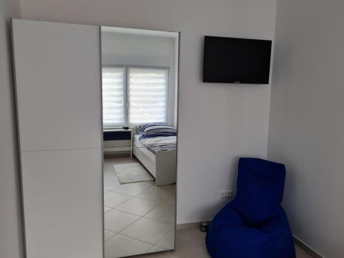 TV a/nebo společenská místnost v ubytování Ferienhaus an der Saar