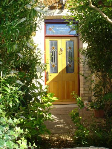 a front door of a house with at Honeycomb House Apartments in Hunstanton