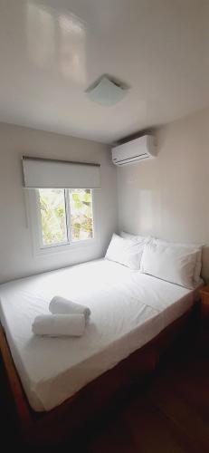 Postel nebo postele na pokoji v ubytování AM Residences